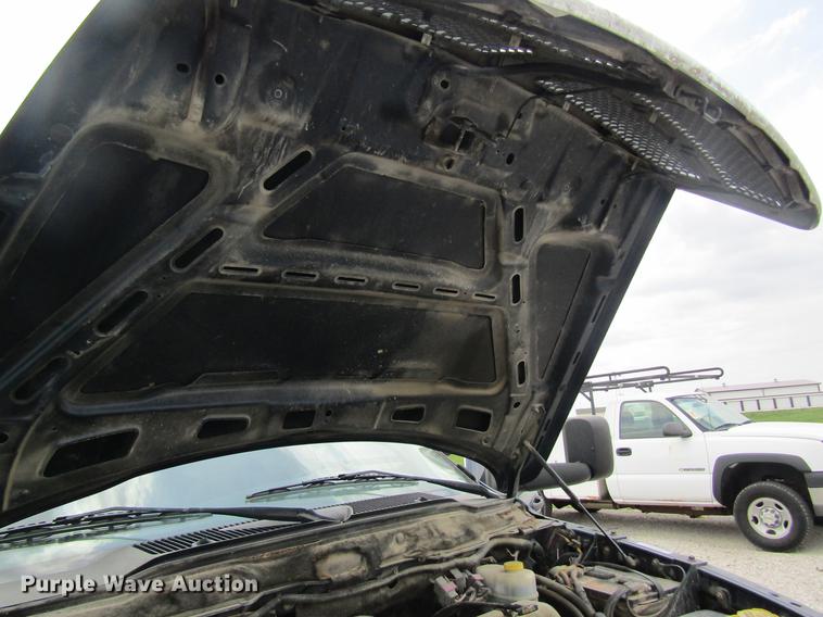 image for item DC4257 2004 Dodge Ram 3500 Quad Cab flatbed pickup truck