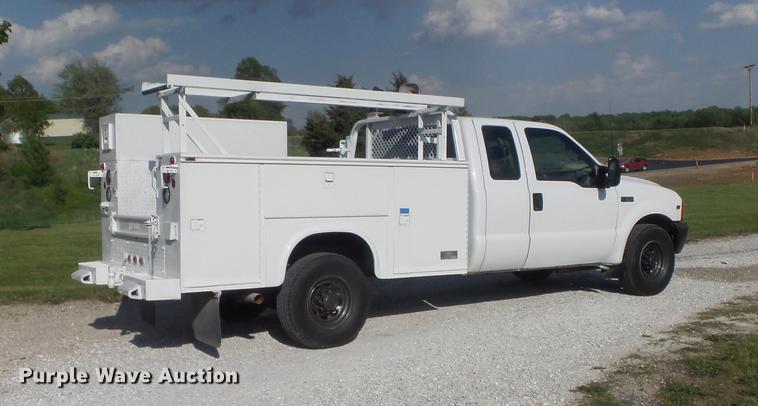 image for item DC7293 2000 Ford F350 Super Duty XL SuperCab utility bed pickup truck