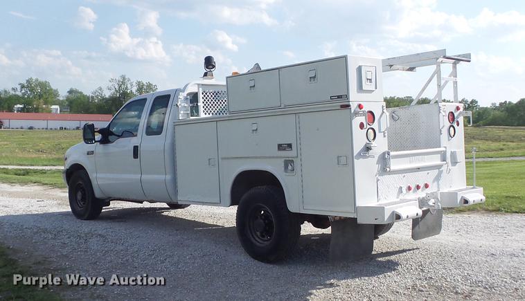 image for item DC7293 2000 Ford F350 Super Duty XL SuperCab utility bed pickup truck