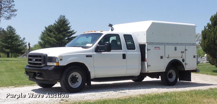 image for item DC7299 2002 Ford F350 Super Duty XL SuperCab utility bed pickup truck
