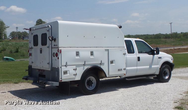 image for item DC7299 2002 Ford F350 Super Duty XL SuperCab utility bed pickup truck