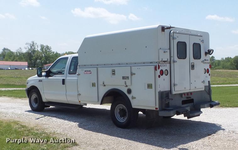 image for item DC7299 2002 Ford F350 Super Duty XL SuperCab utility bed pickup truck