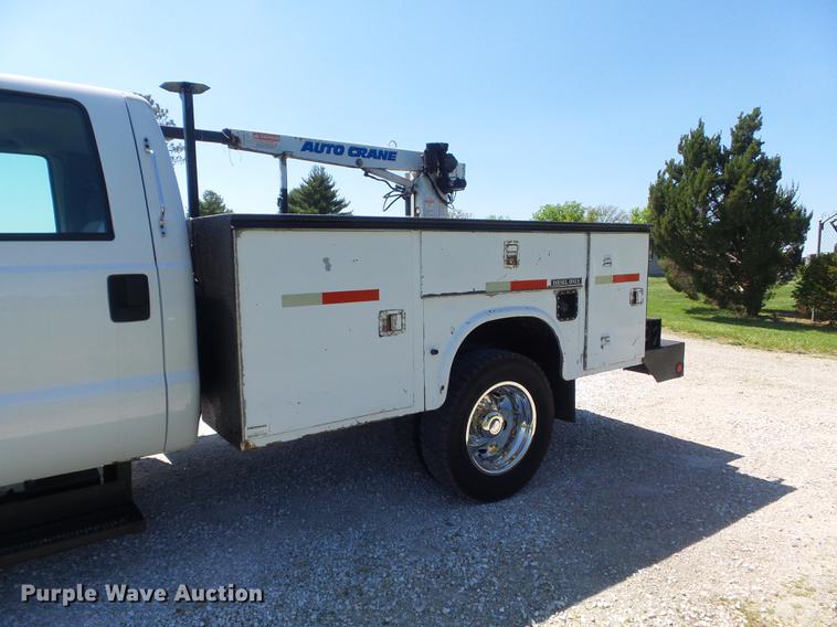 image for item DC7309 2005 Ford F550 Super Duty XL Crew Cab utility truck with crane
