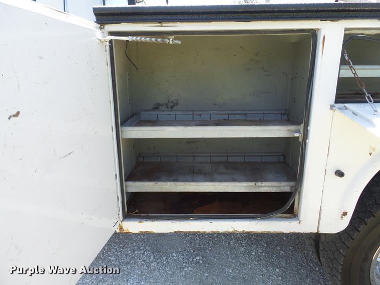 image for item DC7309 2005 Ford F550 Super Duty XL Crew Cab utility truck with crane