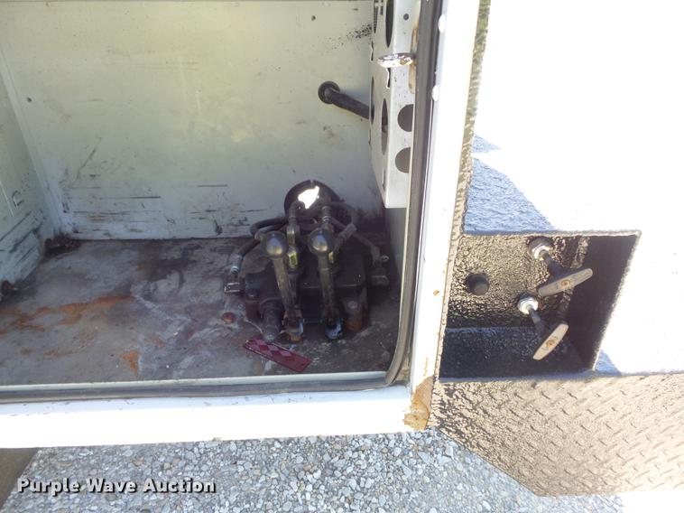 image for item DC7309 2005 Ford F550 Super Duty XL Crew Cab utility truck with crane