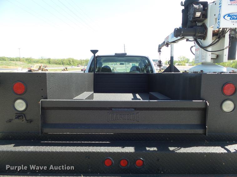 image for item DC7309 2005 Ford F550 Super Duty XL Crew Cab utility truck with crane