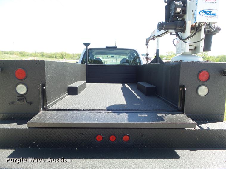 image for item DC7309 2005 Ford F550 Super Duty XL Crew Cab utility truck with crane