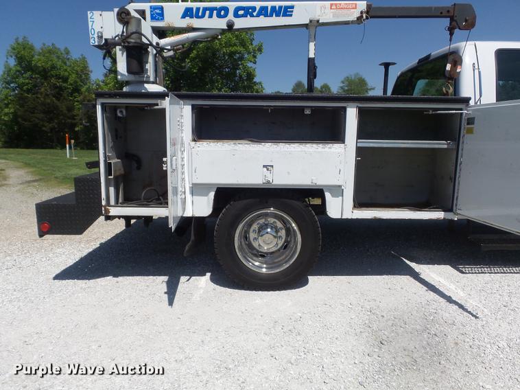 image for item DC7309 2005 Ford F550 Super Duty XL Crew Cab utility truck with crane