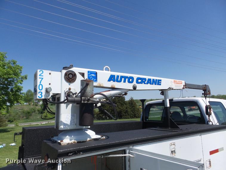 image for item DC7309 2005 Ford F550 Super Duty XL Crew Cab utility truck with crane