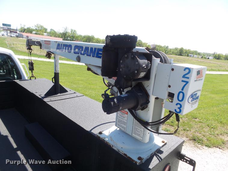 image for item DC7309 2005 Ford F550 Super Duty XL Crew Cab utility truck with crane