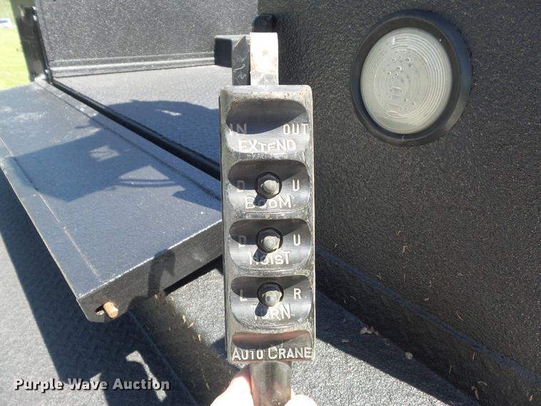 image for item DC7309 2005 Ford F550 Super Duty XL Crew Cab utility truck with crane