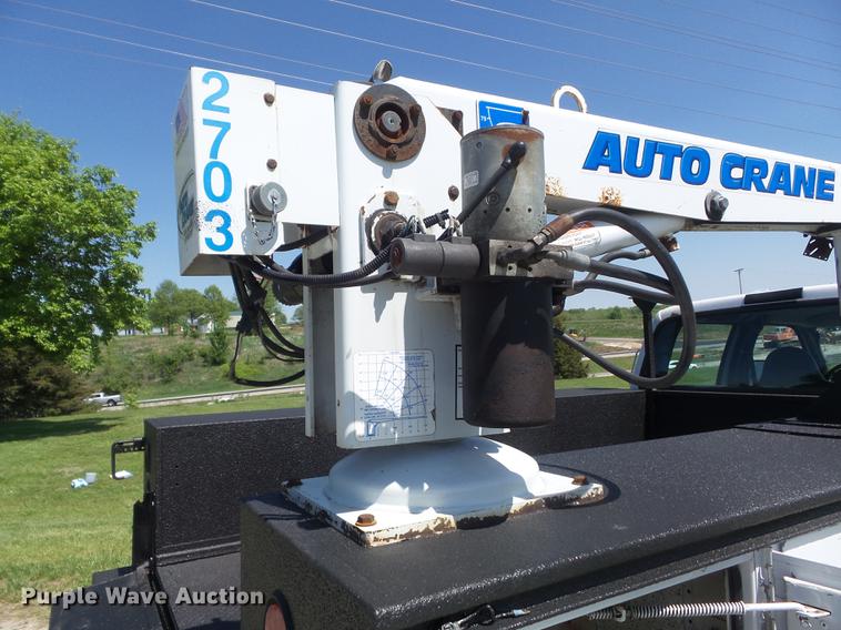 image for item DC7309 2005 Ford F550 Super Duty XL Crew Cab utility truck with crane