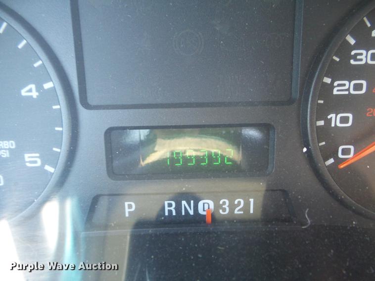 image for item DC7309 2005 Ford F550 Super Duty XL Crew Cab utility truck with crane