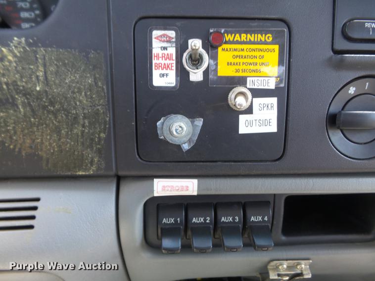 image for item DC7309 2005 Ford F550 Super Duty XL Crew Cab utility truck with crane