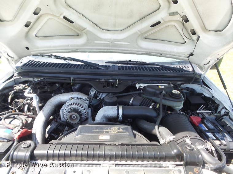 image for item DC7309 2005 Ford F550 Super Duty XL Crew Cab utility truck with crane