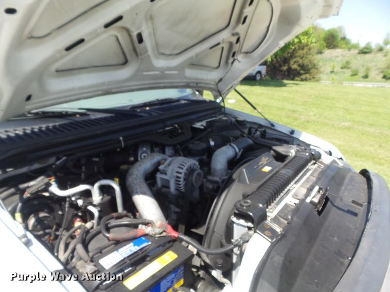 image for item DC7309 2005 Ford F550 Super Duty XL Crew Cab utility truck with crane