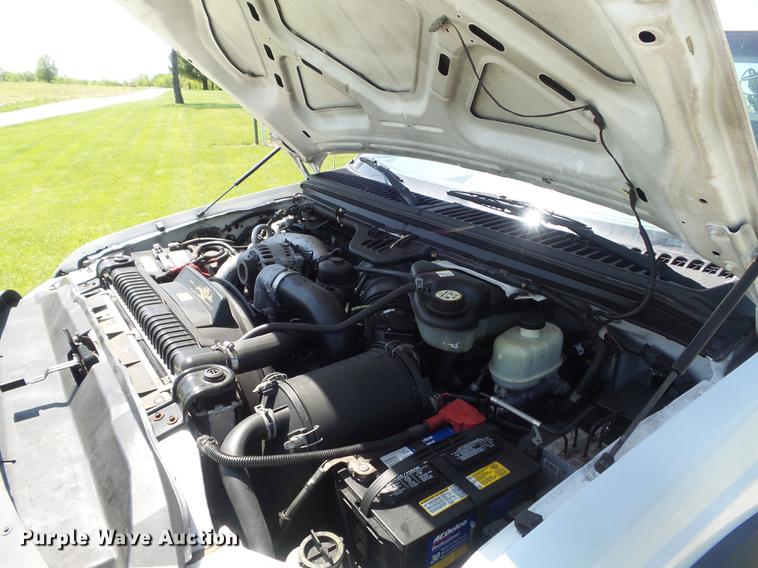 image for item DC7309 2005 Ford F550 Super Duty XL Crew Cab utility truck with crane