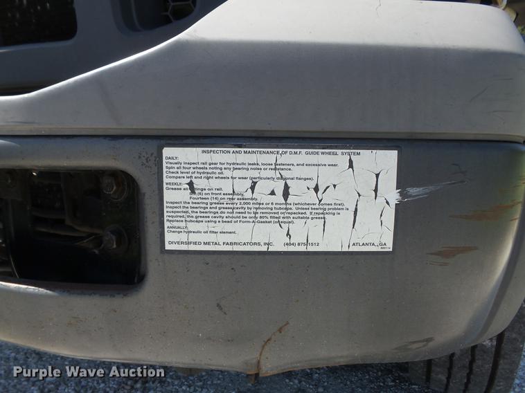 image for item DC7309 2005 Ford F550 Super Duty XL Crew Cab utility truck with crane