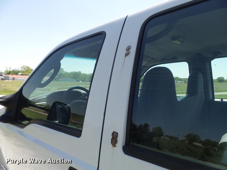 image for item DC7309 2005 Ford F550 Super Duty XL Crew Cab utility truck with crane