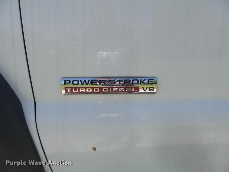 image for item DC7309 2005 Ford F550 Super Duty XL Crew Cab utility truck with crane