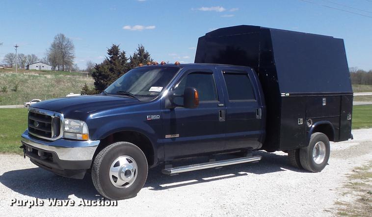 image for item DC7324 2004 Ford F350 Super Duty Lariat Crew Cab utility bed pickup truck