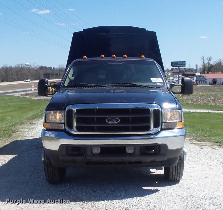 image for item DC7324 2004 Ford F350 Super Duty Lariat Crew Cab utility bed pickup truck