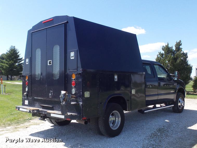 image for item DC7324 2004 Ford F350 Super Duty Lariat Crew Cab utility bed pickup truck