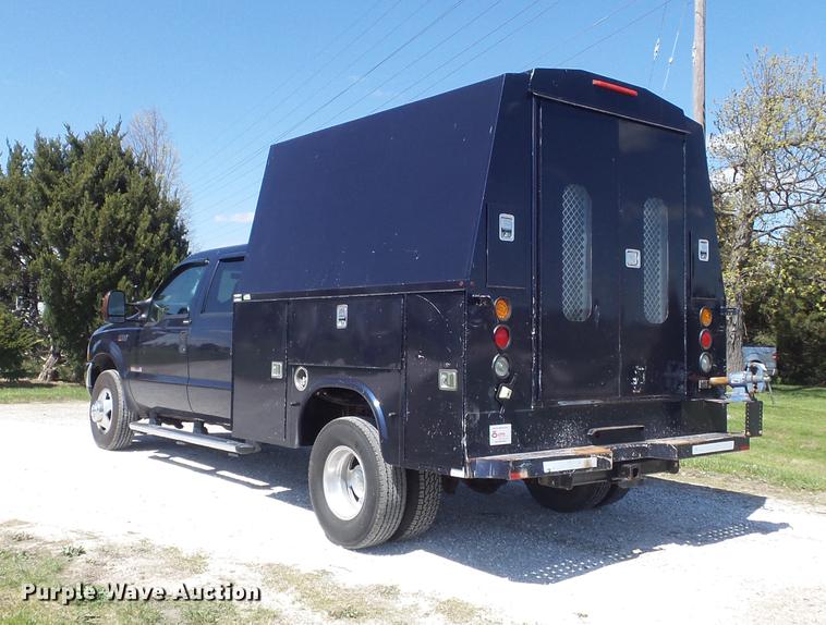 image for item DC7324 2004 Ford F350 Super Duty Lariat Crew Cab utility bed pickup truck