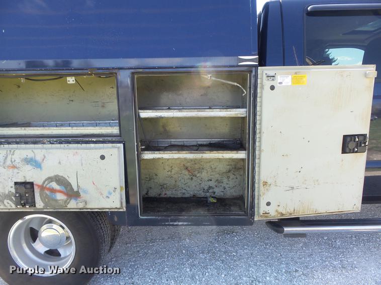 image for item DC7324 2004 Ford F350 Super Duty Lariat Crew Cab utility bed pickup truck