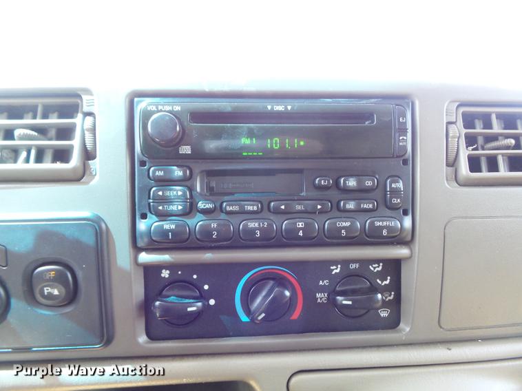 image for item DC7324 2004 Ford F350 Super Duty Lariat Crew Cab utility bed pickup truck