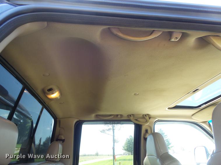 image for item DC7324 2004 Ford F350 Super Duty Lariat Crew Cab utility bed pickup truck