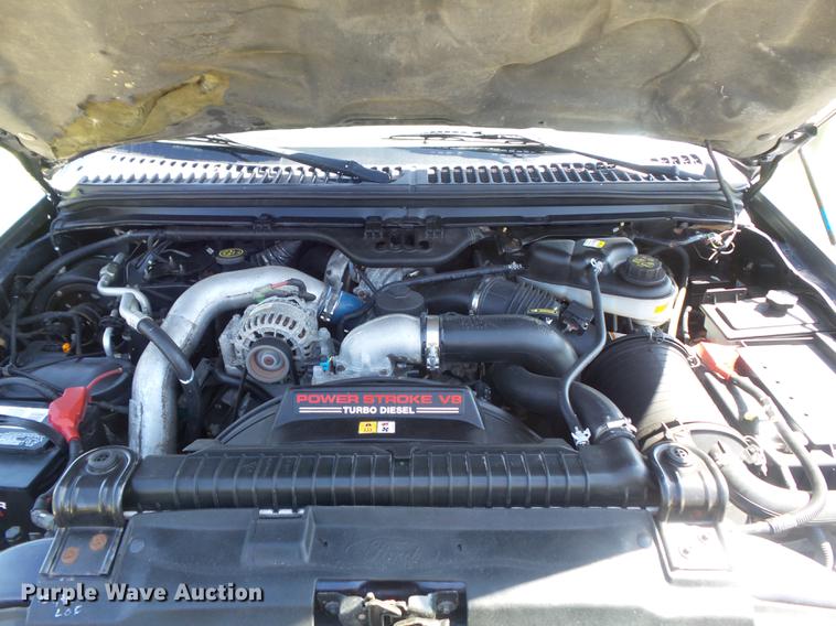 image for item DC7324 2004 Ford F350 Super Duty Lariat Crew Cab utility bed pickup truck