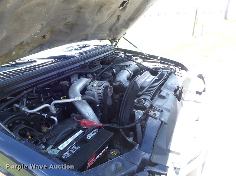 image for item DC7324 2004 Ford F350 Super Duty Lariat Crew Cab utility bed pickup truck