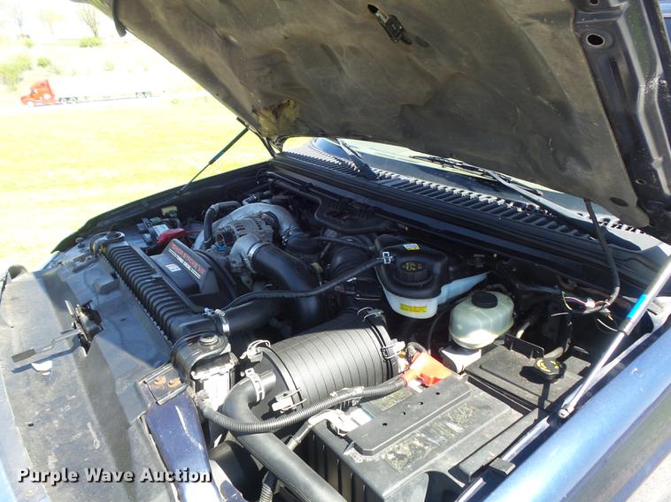 image for item DC7324 2004 Ford F350 Super Duty Lariat Crew Cab utility bed pickup truck