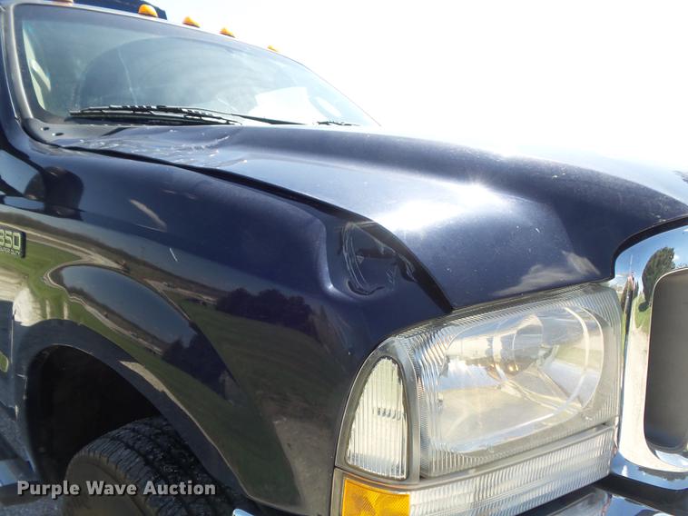 image for item DC7324 2004 Ford F350 Super Duty Lariat Crew Cab utility bed pickup truck