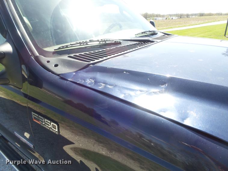 image for item DC7324 2004 Ford F350 Super Duty Lariat Crew Cab utility bed pickup truck