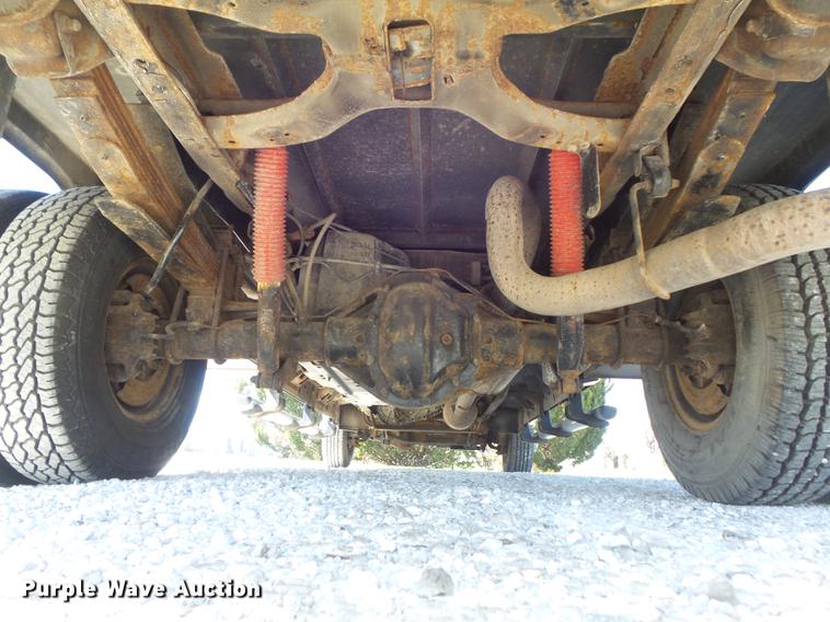 image for item DC7324 2004 Ford F350 Super Duty Lariat Crew Cab utility bed pickup truck