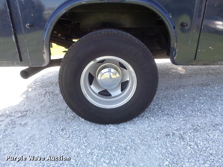 image for item DC7324 2004 Ford F350 Super Duty Lariat Crew Cab utility bed pickup truck