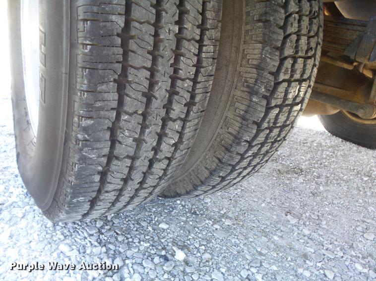 image for item DC7324 2004 Ford F350 Super Duty Lariat Crew Cab utility bed pickup truck