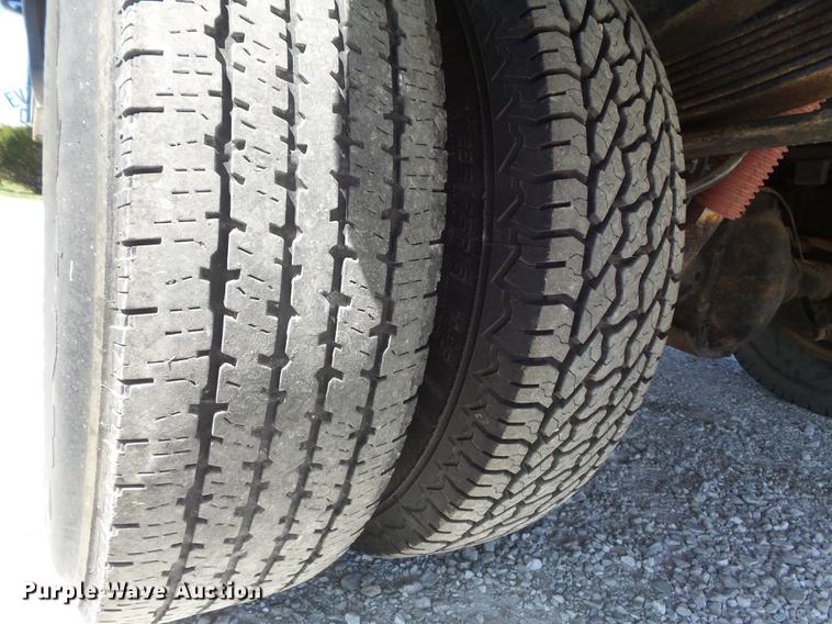 image for item DC7324 2004 Ford F350 Super Duty Lariat Crew Cab utility bed pickup truck