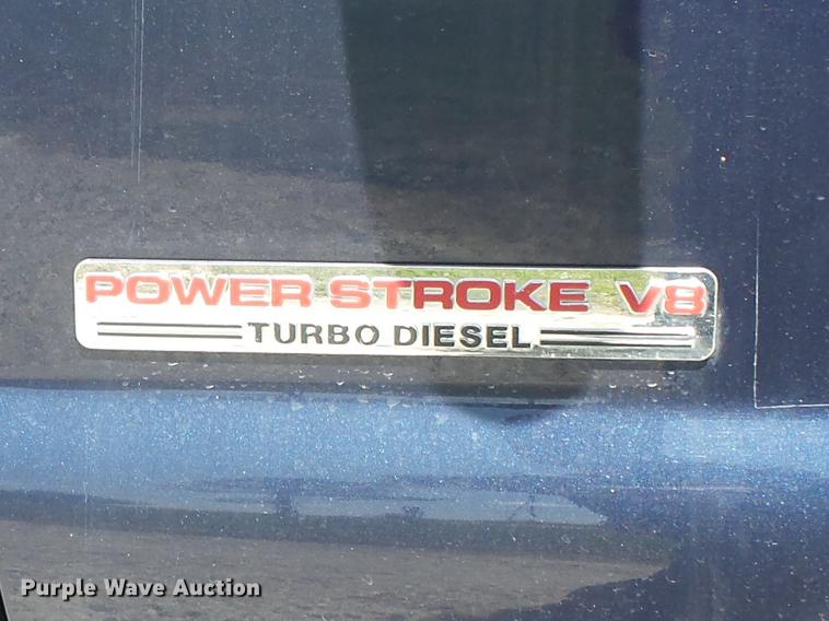 image for item DC7324 2004 Ford F350 Super Duty Lariat Crew Cab utility bed pickup truck