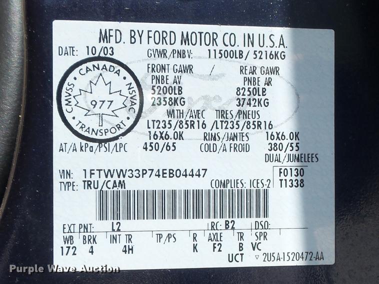 image for item DC7324 2004 Ford F350 Super Duty Lariat Crew Cab utility bed pickup truck