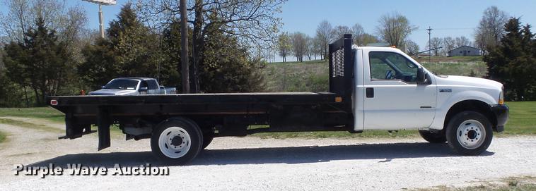 image for item DC7328 2002 Ford F550 Super Duty XL flatbed truck
