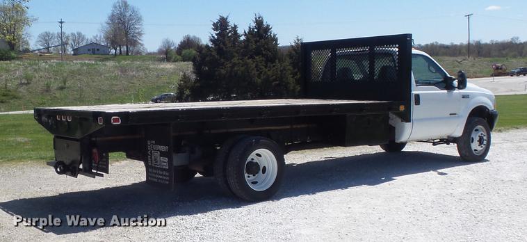 image for item DC7328 2002 Ford F550 Super Duty XL flatbed truck