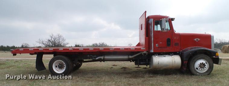 image for item DD1312 1991 Peterbilt 377 flatbed truck
