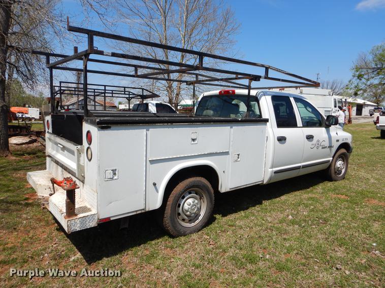 image for item EI9057 2006 Dodge Ram 2500 Quad Cab utility bed pickup truck