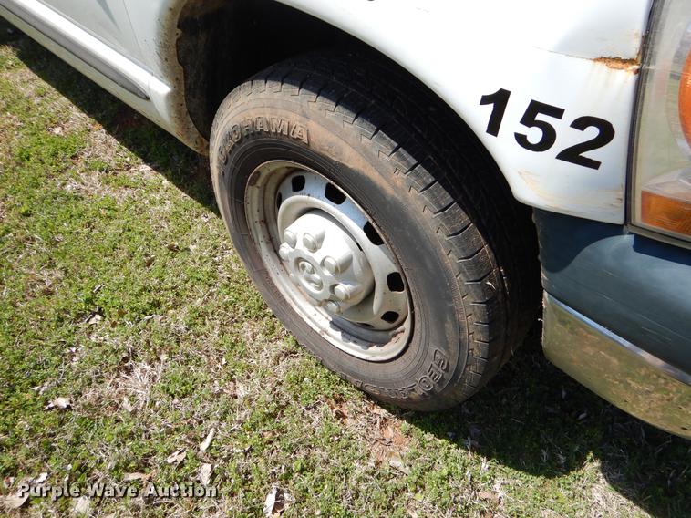 image for item EI9057 2006 Dodge Ram 2500 Quad Cab utility bed pickup truck