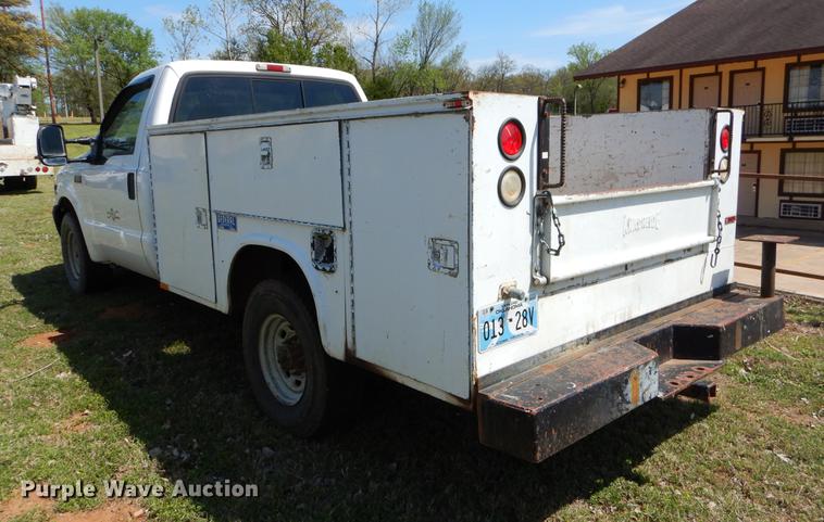 image for item EI9058 2000 Ford F350 Super Duty utility bed pickup truck