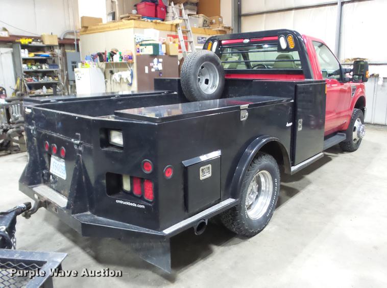 image for item EI9798 2008 Ford F350 Super Duty flatbed pickup truck