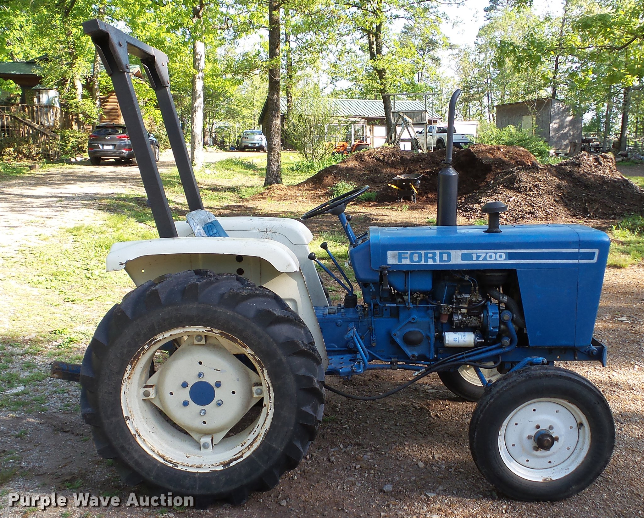 Ford 1700 tractor in Royal, AR Item DC5547 sold Purple Wave